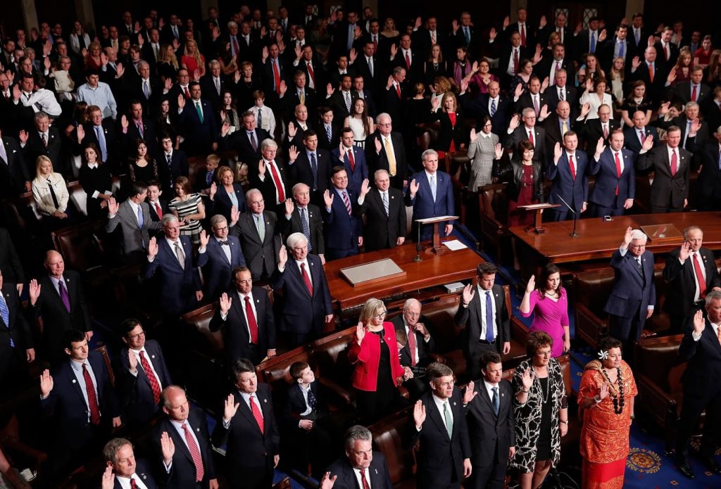 United States Representatives with hands up